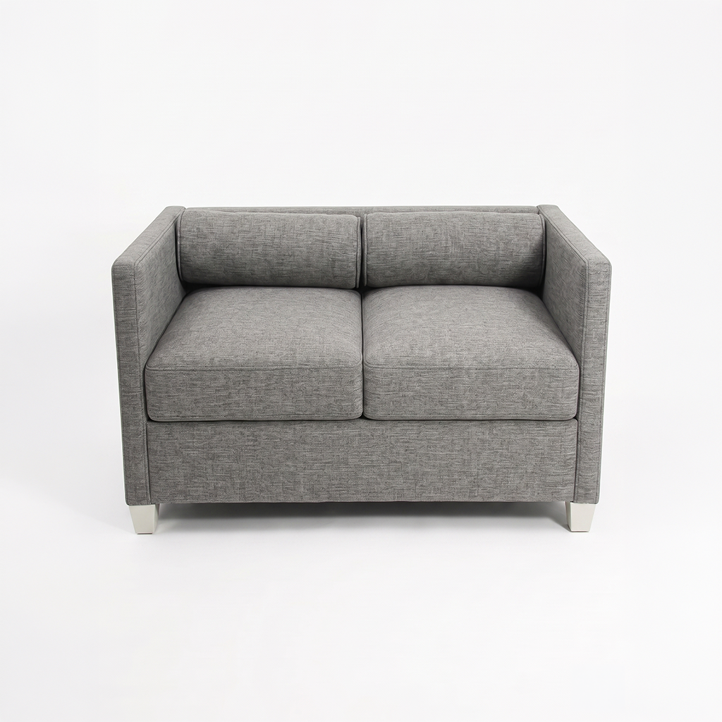 Gray fabric two-seat sofa with square arms and metal legs on a white studio background.